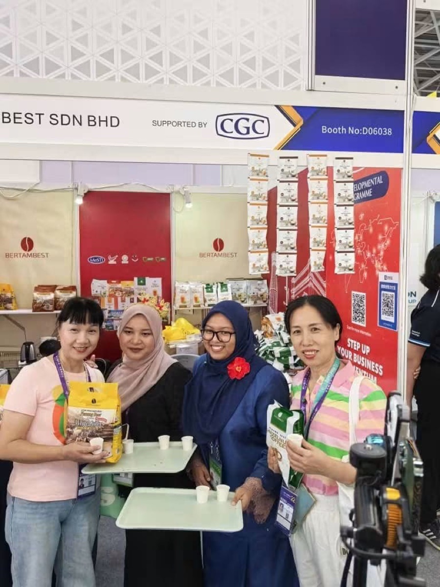 BERTAMBEST booth at the Shanghai trade expo with staff serving product samples to visitors